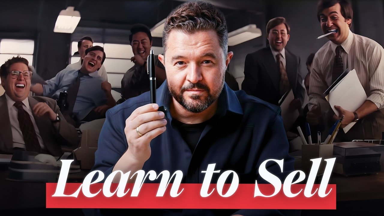 Daniel Priestley holding a pen to camera in a mocked-up trading floor, with the words Learn to Sell across a red band
